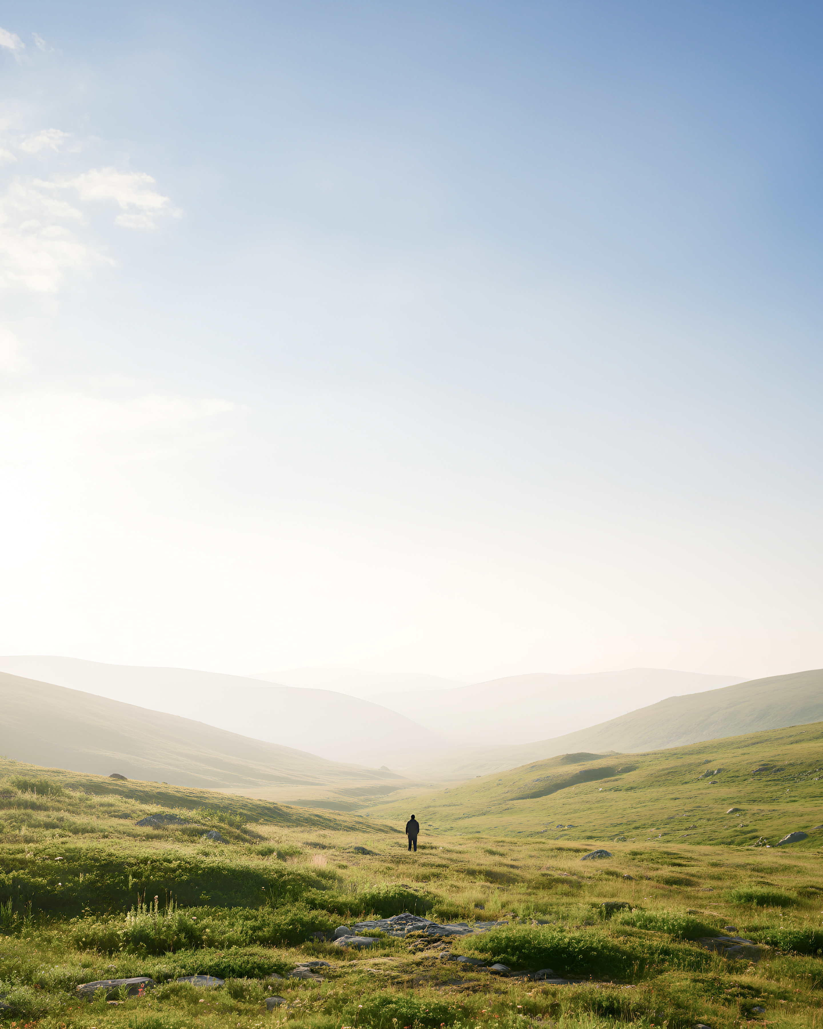 Man Standing On Hill